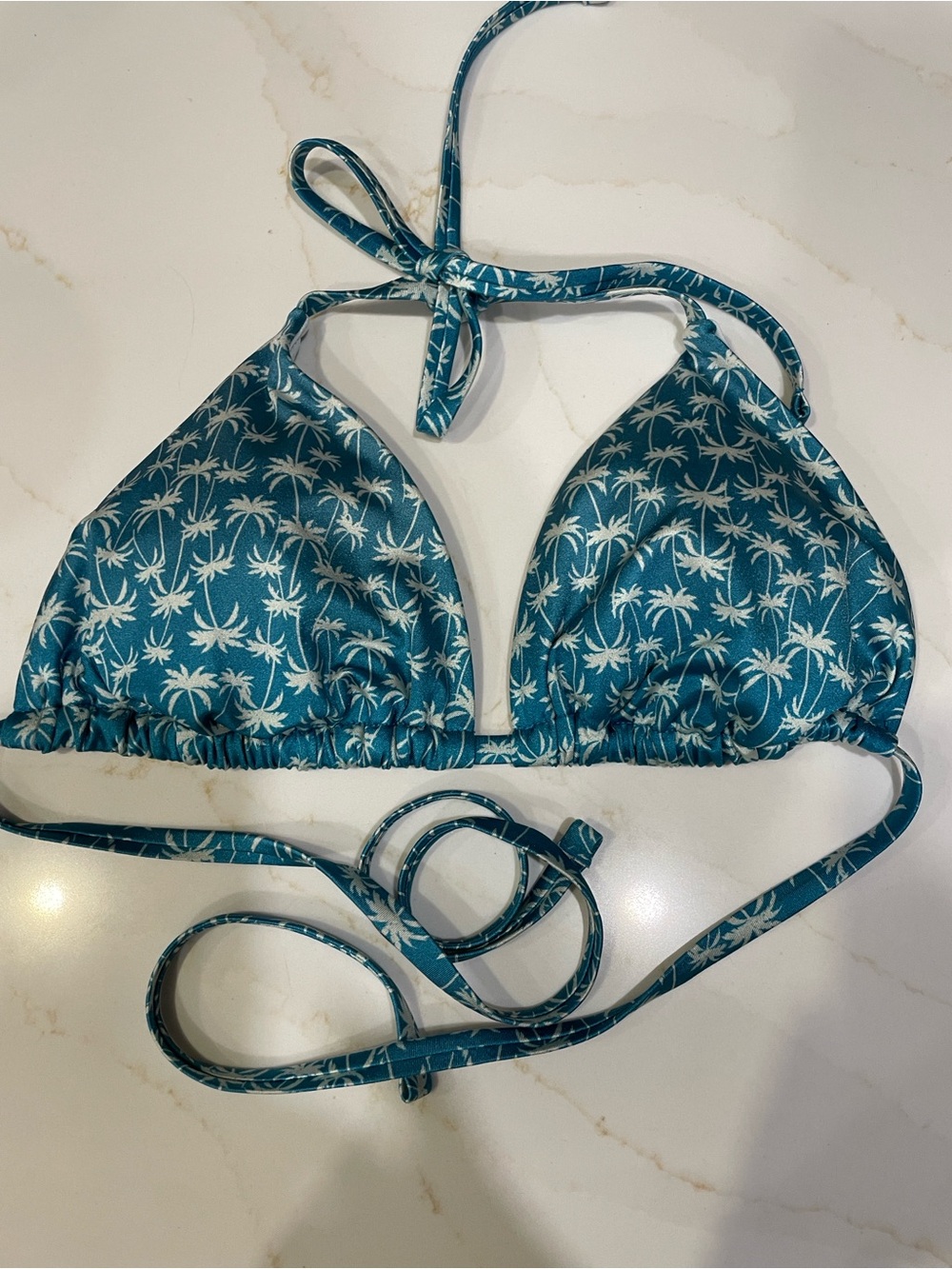 Victoria’s Secret Swim, tiny triangle bikini, top in blue palms.